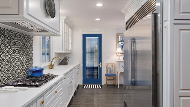 Full-glass Smooth-Star entry door painted blue, seen from the kitchen